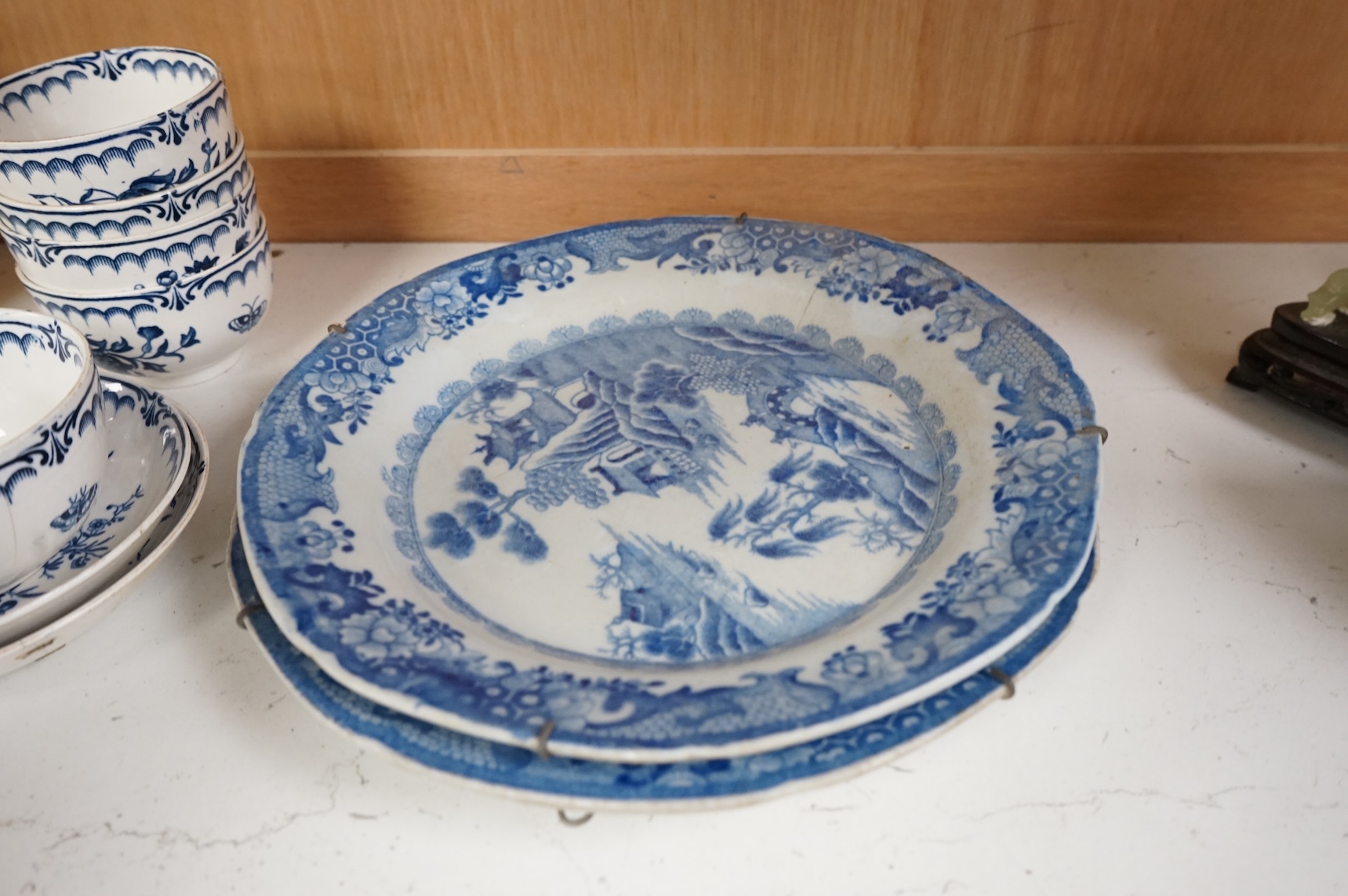 An 18th century blue and white Worcester jug and assorted Booths Worcester style tea wares, largest 24cm high